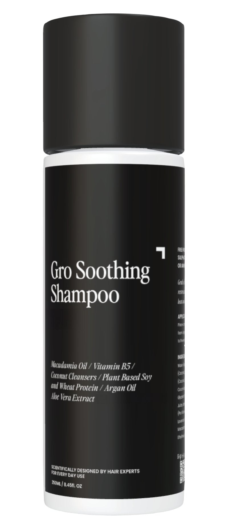 A bottle of Gro Clinics Soothing Shampoo is shown. The label highlights nourishing agents such as macadamia oil, vitamin B5, coconut cleansers, plant-based soy and wheat protein, argan oil, and aloe vera extract. This revitalizing shampoo comes in a 250ml / 8.45 fl. oz. bottle and is designed for everyday use on dry & damaged hair.