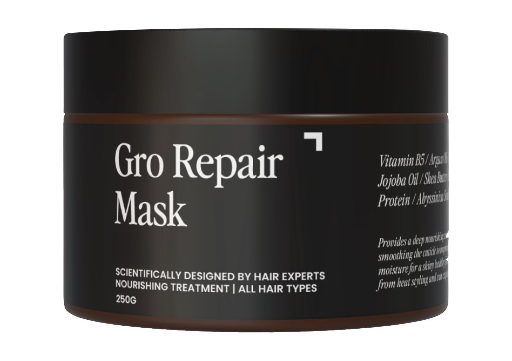 A dark brown and black container labeled "Rapid Hair Repair Mask for Dry, Damaged Hair" from Gro Clinics features text describing it as a nourishing treatment suitable for all hair types, including damaged hair. Scientifically designed by hair experts, the 250-gram container lists key natural ingredients and benefits on the side.